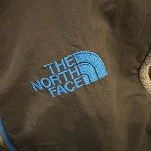 Like new North Face boys Denali black & grey with blue trim. Large 14/16. Fleece